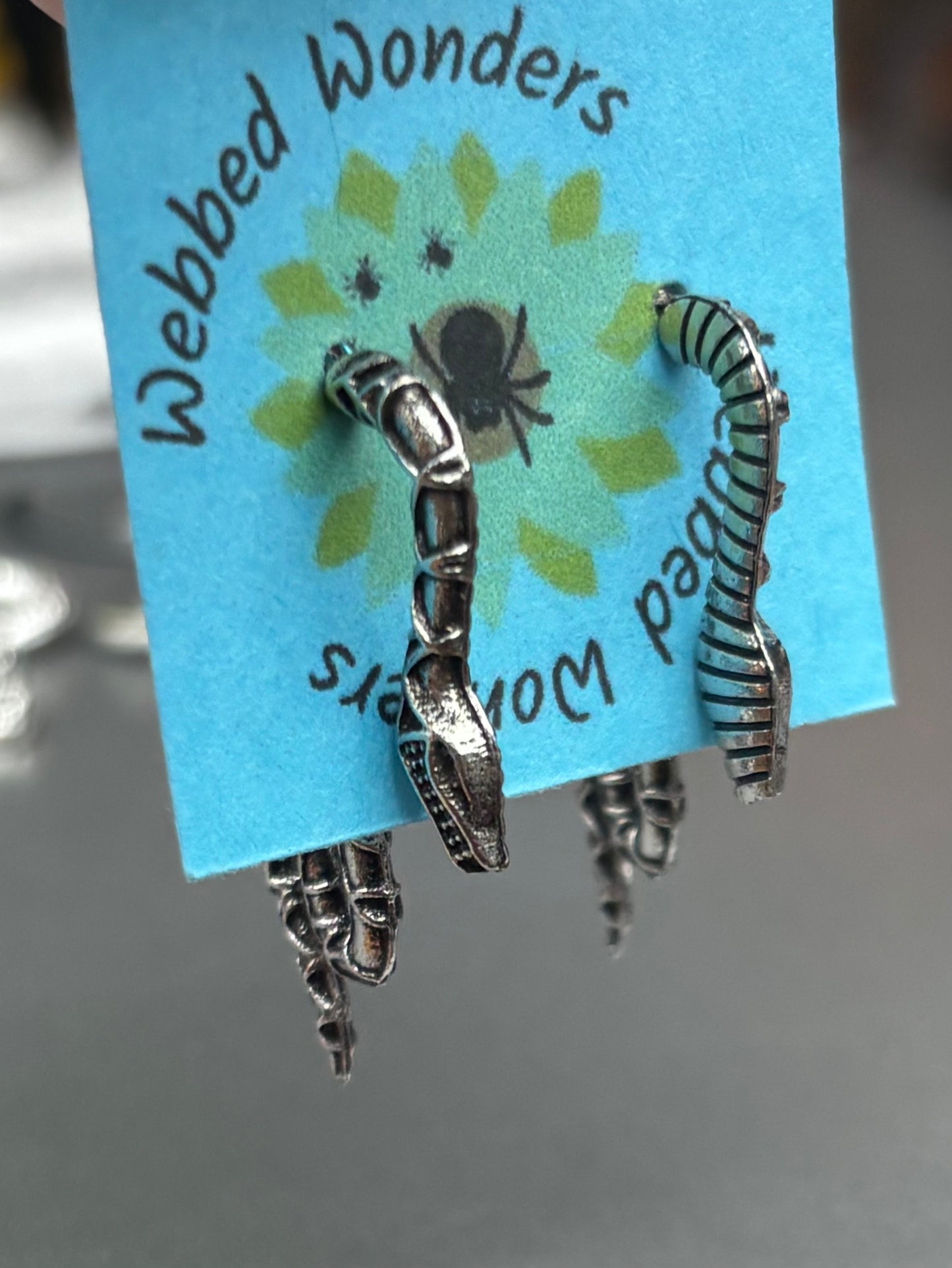 Silver snake dangles