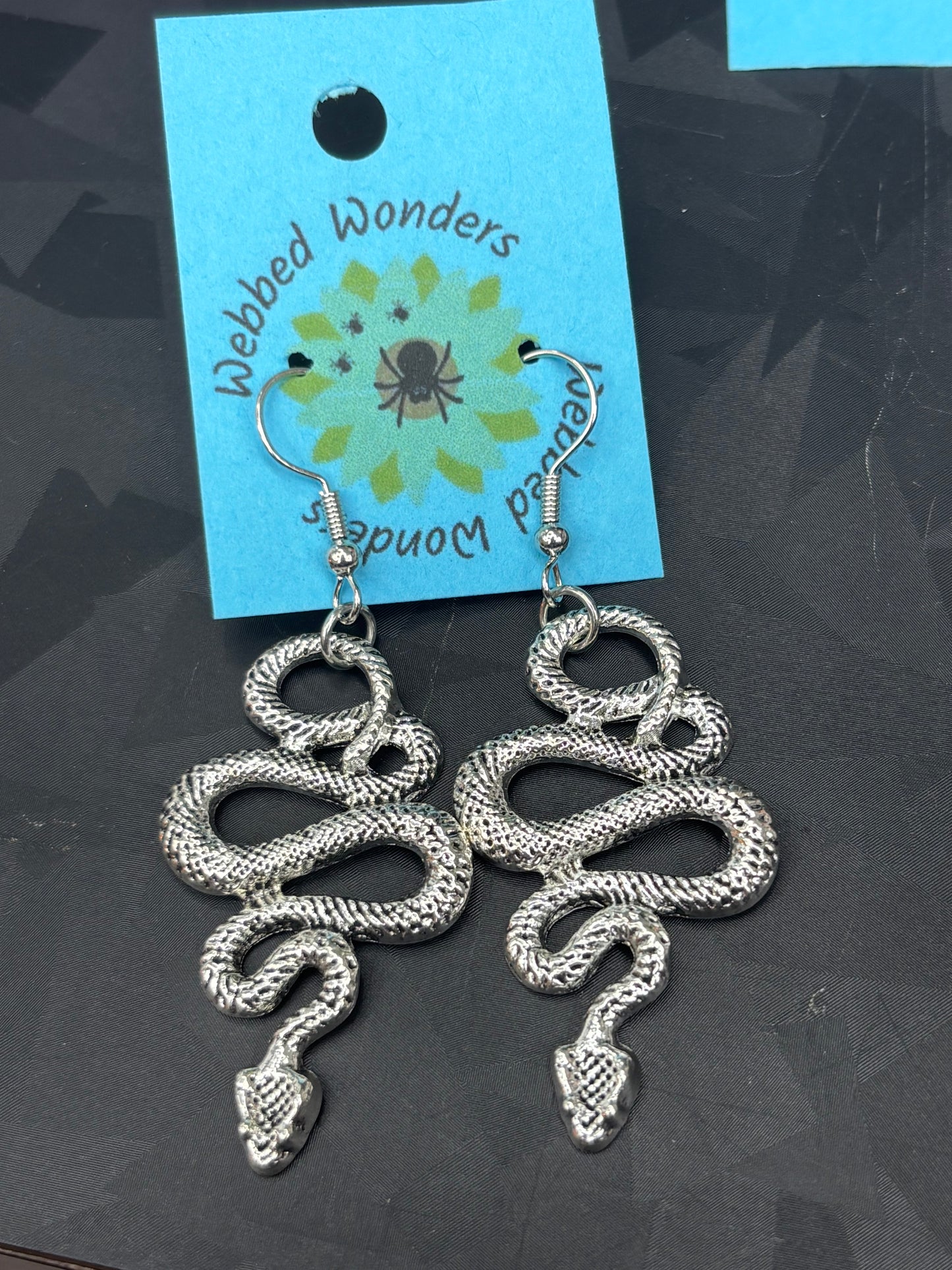 Silver snake dangles